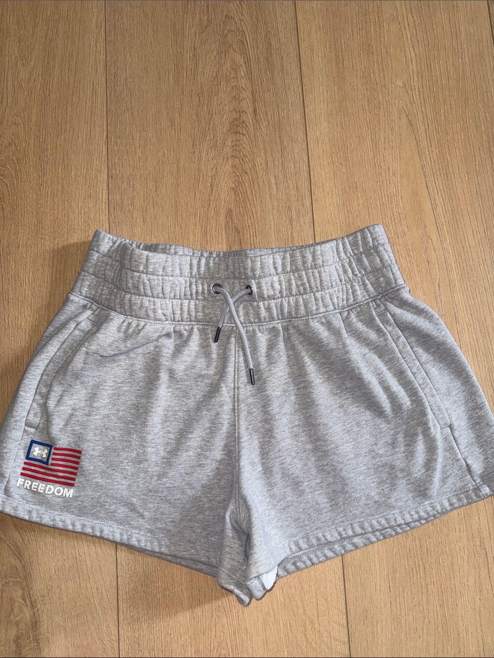 Under Armour Women's Light Gray Athletic Shorts with Flag Accent